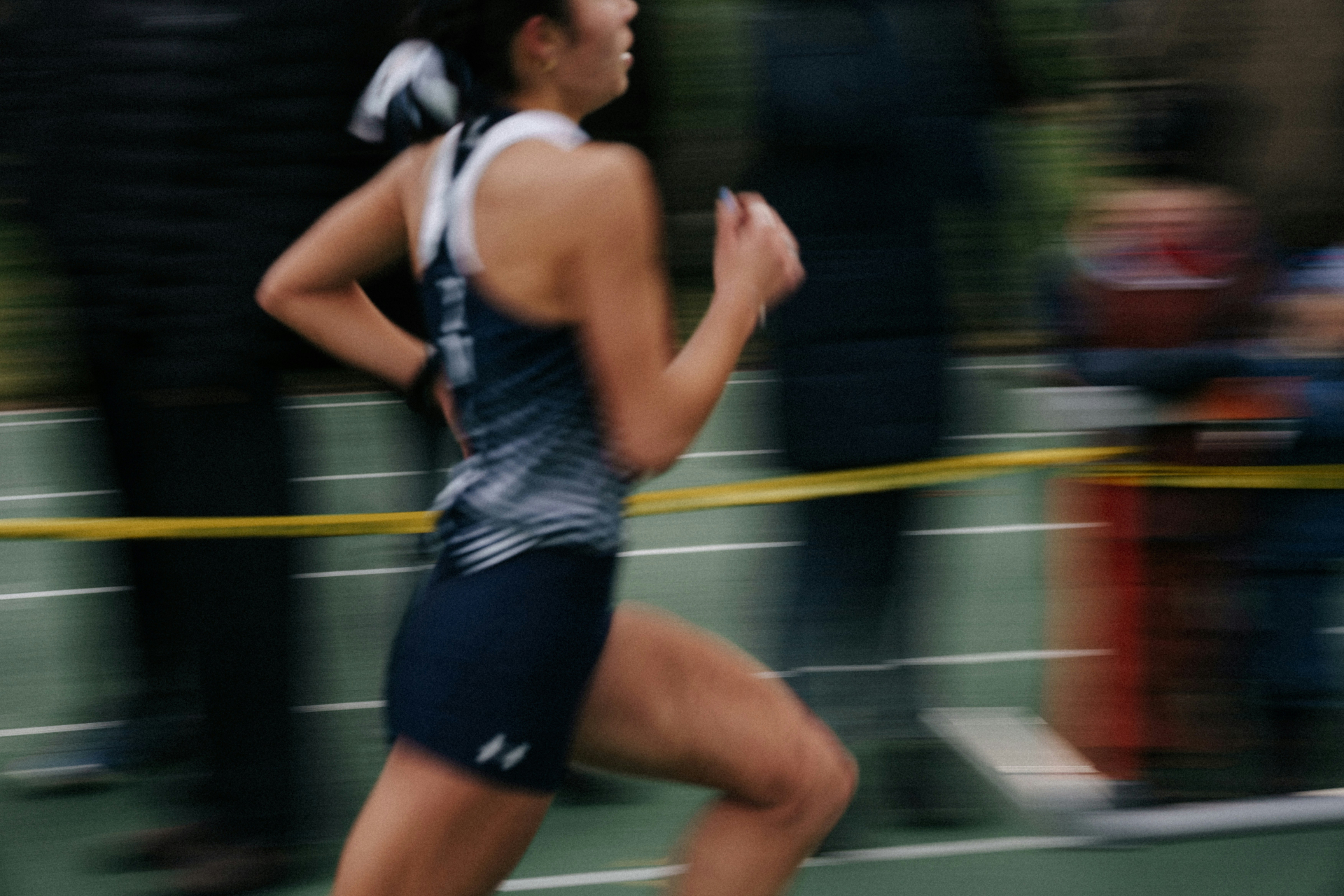 Runner in motion on a track